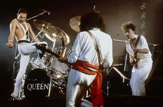 Queen in concert at Wembley Arena, London, Britain - 05 Sep 1984...Mandatory Credit: Photo by Ilpo Musto / Rex Features ( 1271605p ) Queen - Freddie Mercury, Brian May and John Deacon Queen in concert at Wembley Arena, London, Britain - 05 Sep 1984