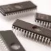 Integrated circuit memory chips, computer components close-up on white background