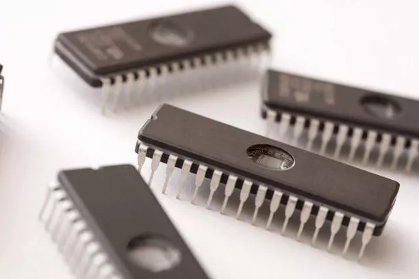 Integrated circuit memory chips, computer components close-up on white background