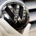 (dpa) - A hand positions a Volkswagen (VW) logo on the radiator grill of a VW Golf Plus at the VW assembly plant in Wolfsburg, Germany, 22 Febuary 2005. VW employs 103800 workers in Germany of whom around 50200 work at the main production plant in Wolfsburg.,Image: 675413694, License: Rights-managed, Restrictions: , Model Release: no