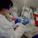 A scientist works at the Pfizer vaccine research and development facility in Pearl River, New York, US, on Thursday, June 16, 2022. Pfizer Inc. emerged from the Covid-19 pandemic as the worlds most visible drugmaker, but its success has left investors impatient for an encore. Photographer: Amir Hamja/Bloomberg